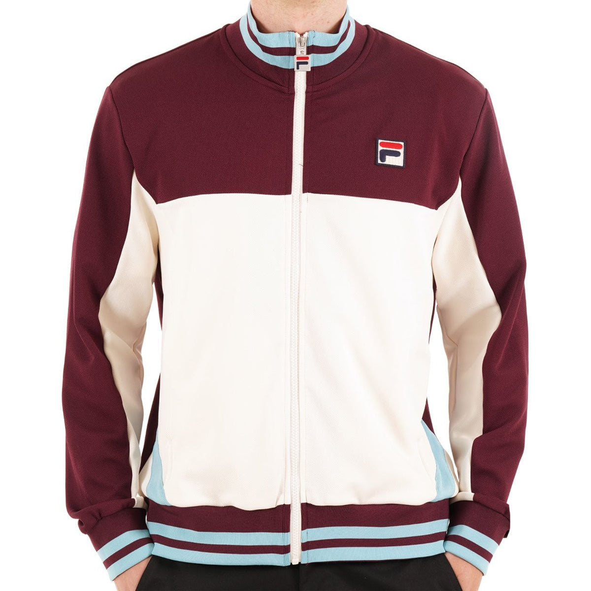 FILA TIEBREAKER FUNNEL NECK TRACK TOP FIG/GARDENIA
